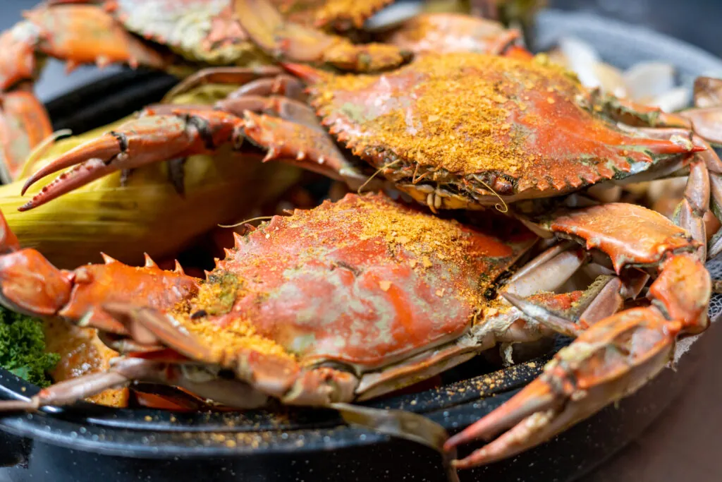 a close up of a plate of crabs