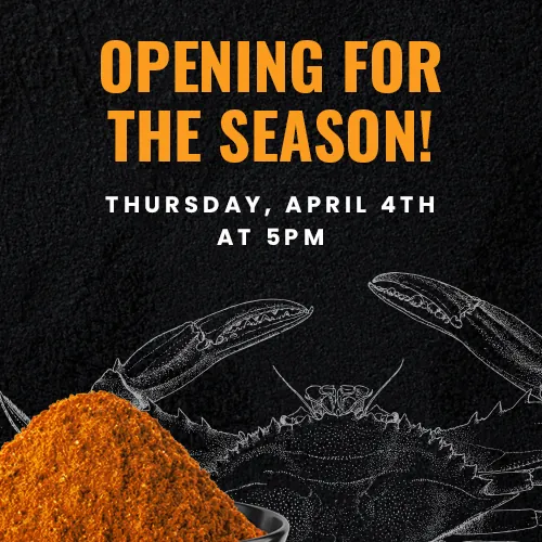 a crab with orange powder on it and the words opening for the season